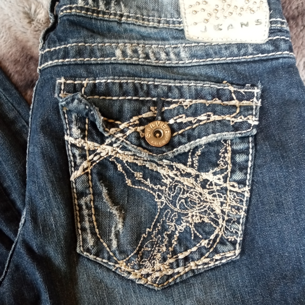 Womens Silver bootcut jeans.